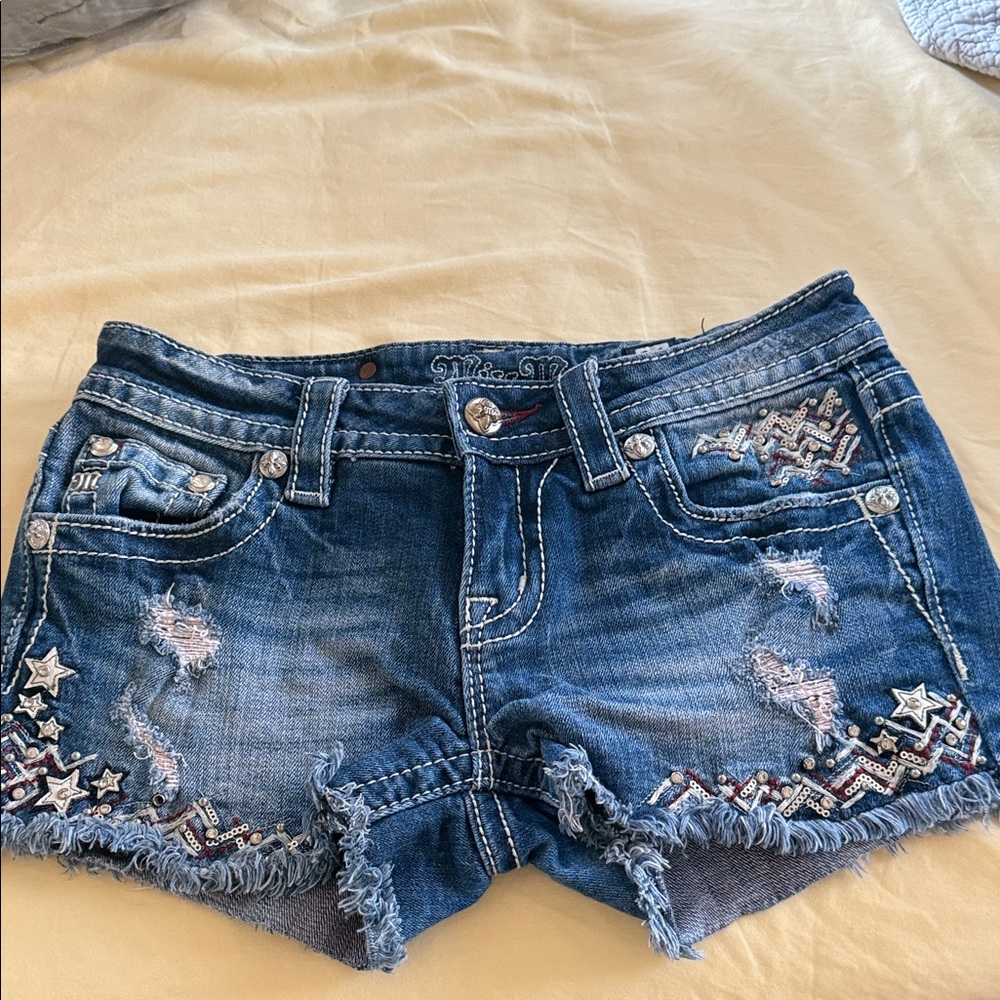 Miss Me Distressed Blue Jean Shorts with Star Embellishments